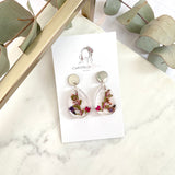 Small tear drop resin dangle, flower garden, silver top