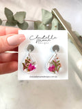 Small tear drop resin dangle, flower garden, silver top