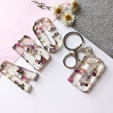Large initial flower confetti key ring