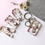 Large initial flower confetti key ring