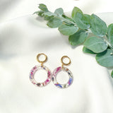 Petite circle flower confetti on gold Huggies