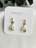 Small native mountain daisy earrings on huggies