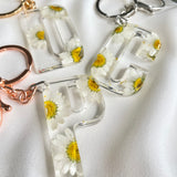 White daisy initial flower confetti key ring