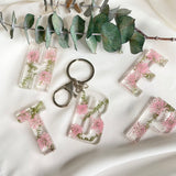 Pink Queen Anne’s Lace initial flower confetti key ring