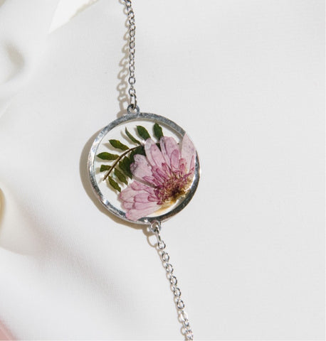 Silver bracelet with pink chrysanthemum flower