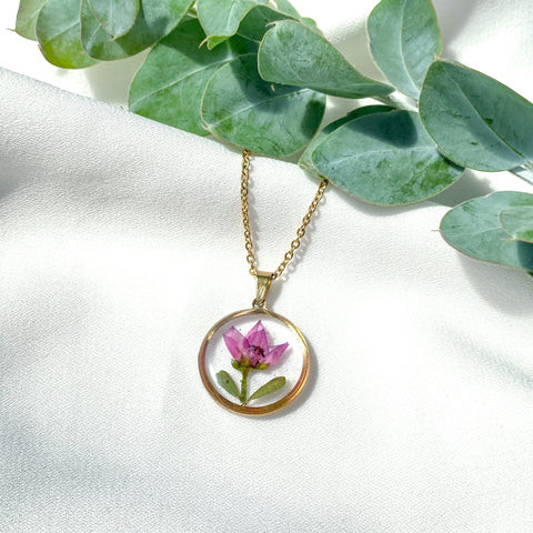 Gold necklace with pink boronia flower