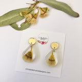 Small tear drop resin dangle with yellow gum blossom