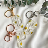 White daisy initial flower confetti key ring