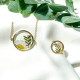 Gold round adjustable size ring with jacaranda leaves