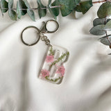 Pink Queen Anne’s Lace initial flower confetti key ring