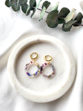 Petite circle flower confetti on gold Huggies