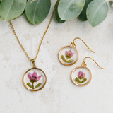 Gold necklace with pink boronia flower