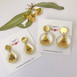 Small tear drop resin dangle with yellow gum blossom