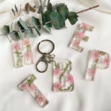 Pink Queen Anne’s Lace initial flower confetti key ring